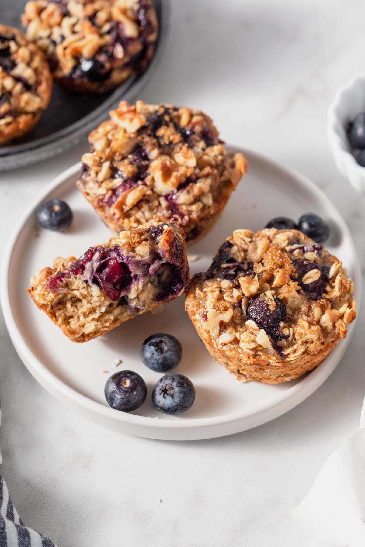 blueberry oatmeal cups for breakfast on a plate.