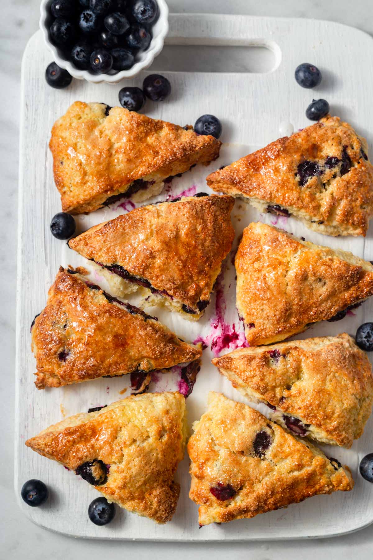 air fryer blueberry scones on a cutting board