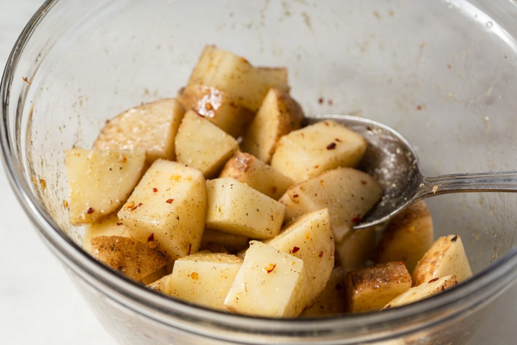 potatoes mixed with dressing