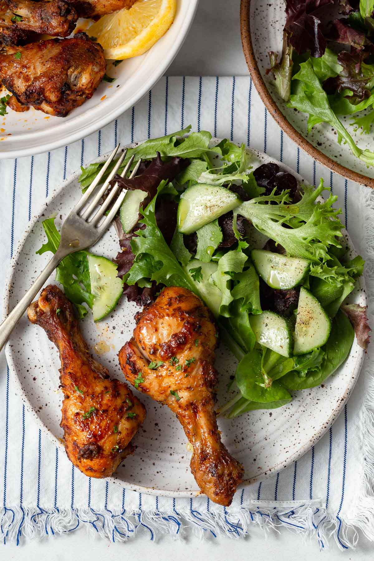 chicken legs with salad