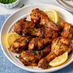 air fried chicken legs with lemon slices