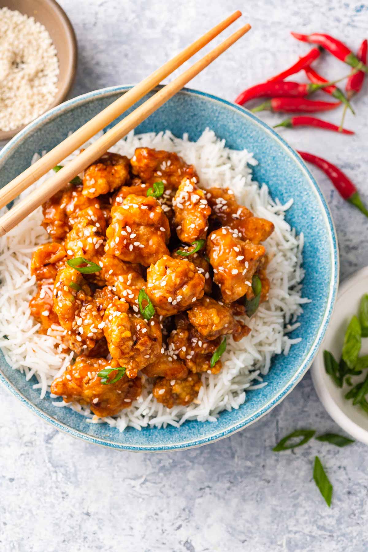 air fryer general Tso's chicken in a bowl with rice