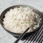 basmati rice in a bowl with fork