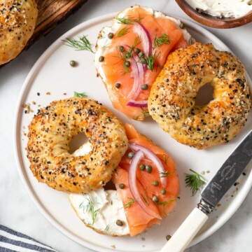 2 air fryer bagels with cream cheese.