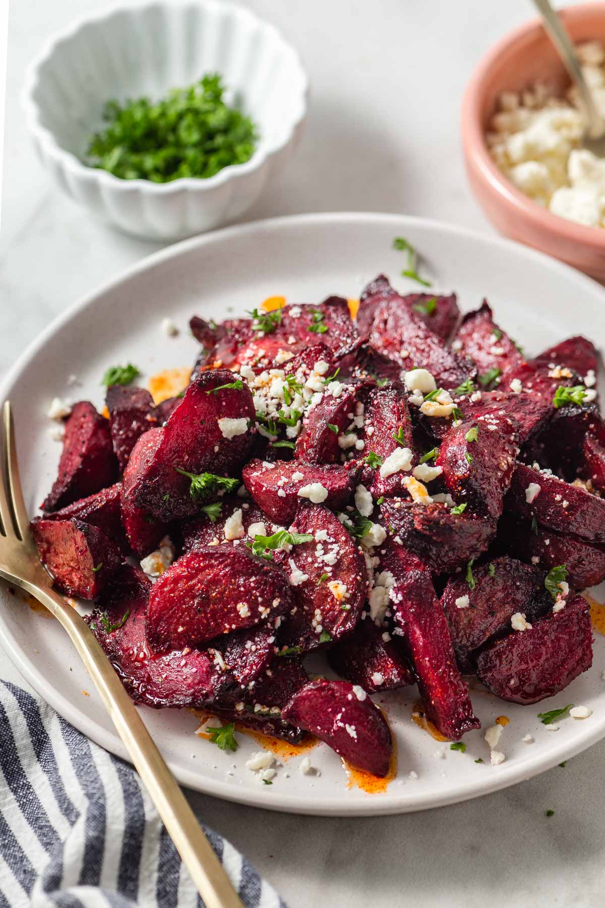 air fryer beets with feta on a plate.