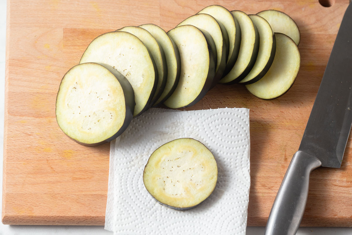 sliced eggplants patted dry with paper towels.