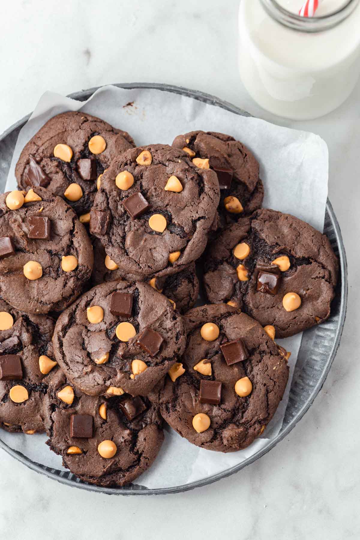 chocolate cake mix cookies with chocolate chips on a plate.