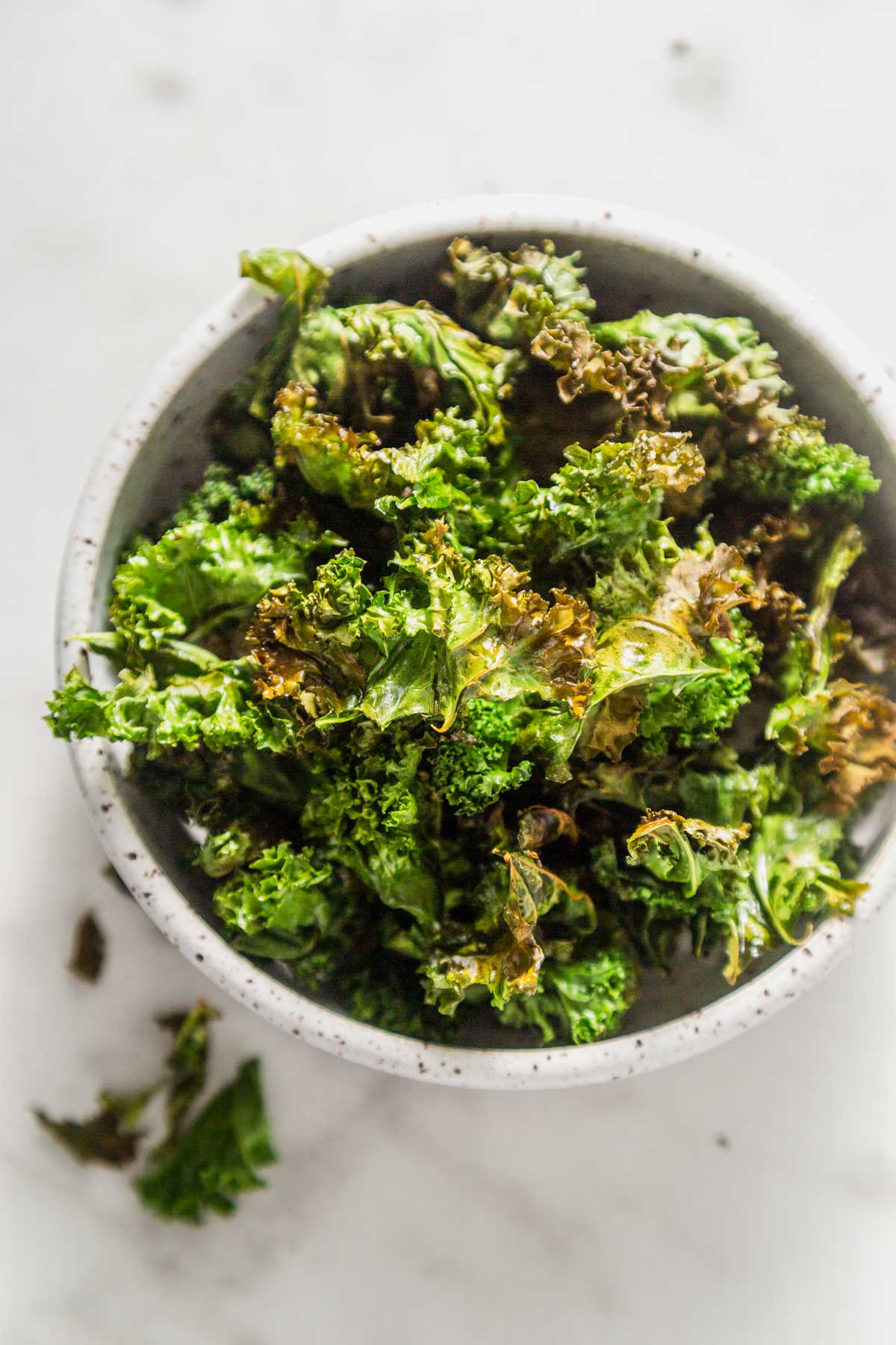 air fried kale chips in a bowl.