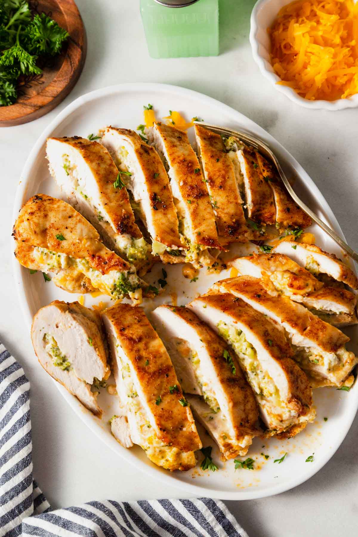 air fryer stuffed chicken breasts with broccoli and cheese sliced.