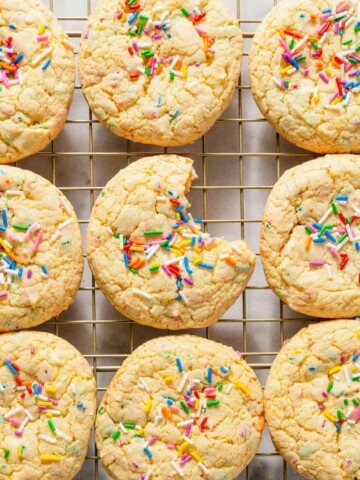 yellow cake mix cookies on a cooling rack.