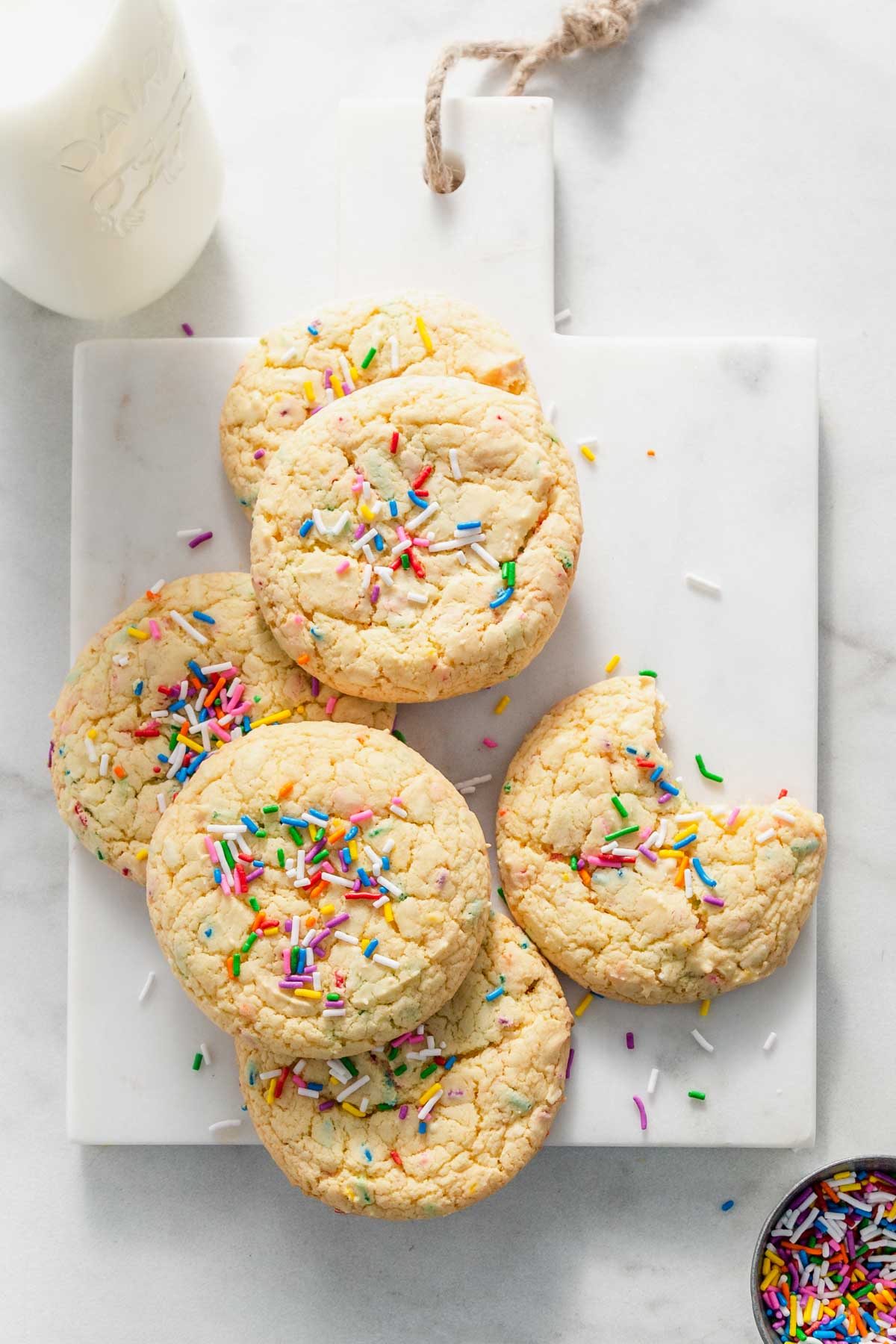 yellow cake mix cookies on a board.