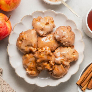 air fryer apple fritters on a plate.