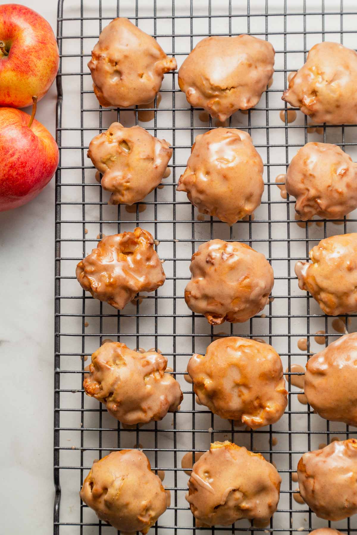 air fryer apple fritters on the rack.