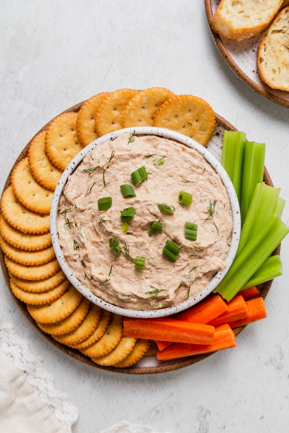 easy tuna dip recipe with crackers and vegetables.