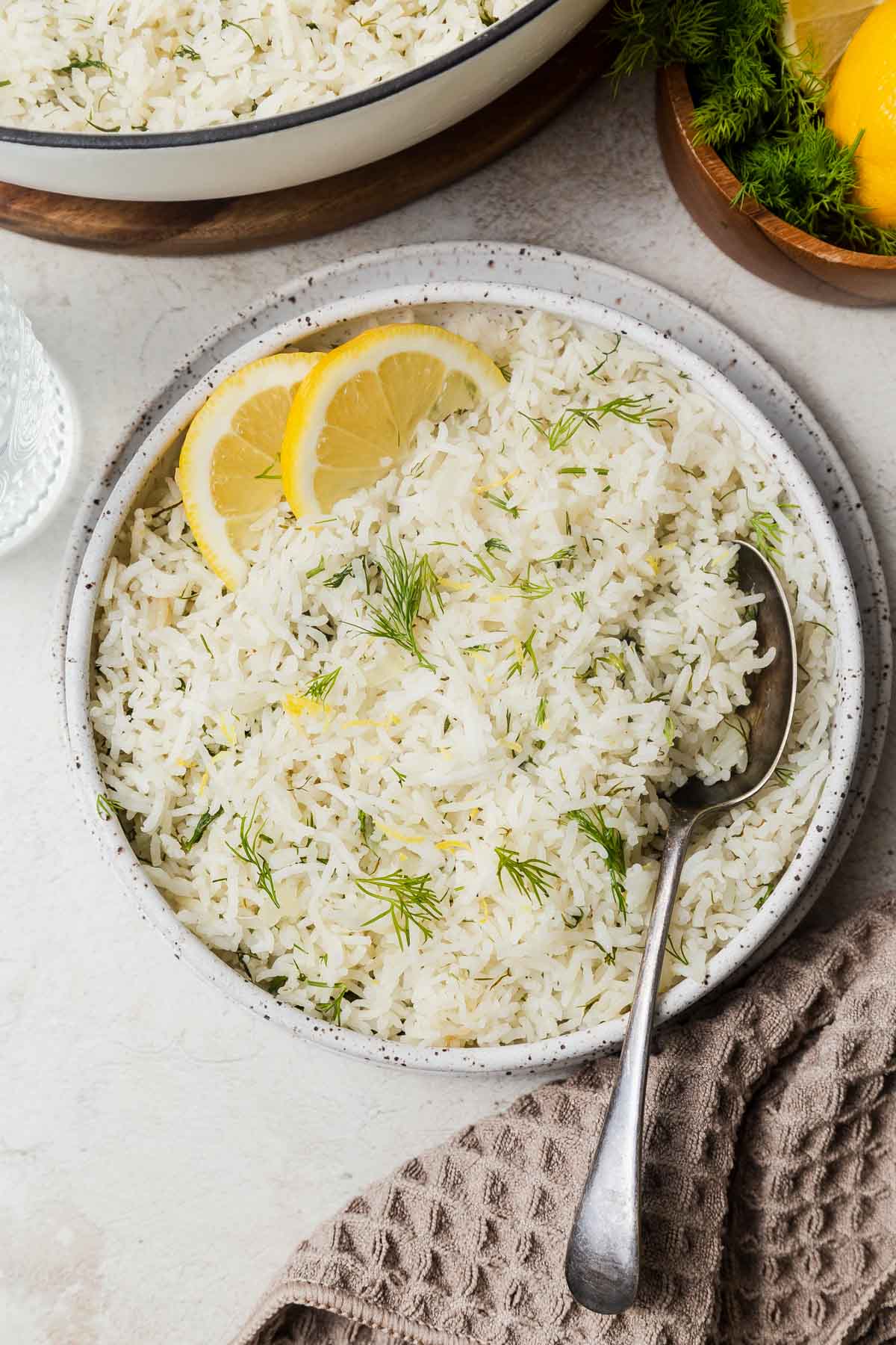 easy one pot lemon dill rice on a plate with a spoon.