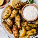 air fried lemon pepper chicken wings with ranch dressing.