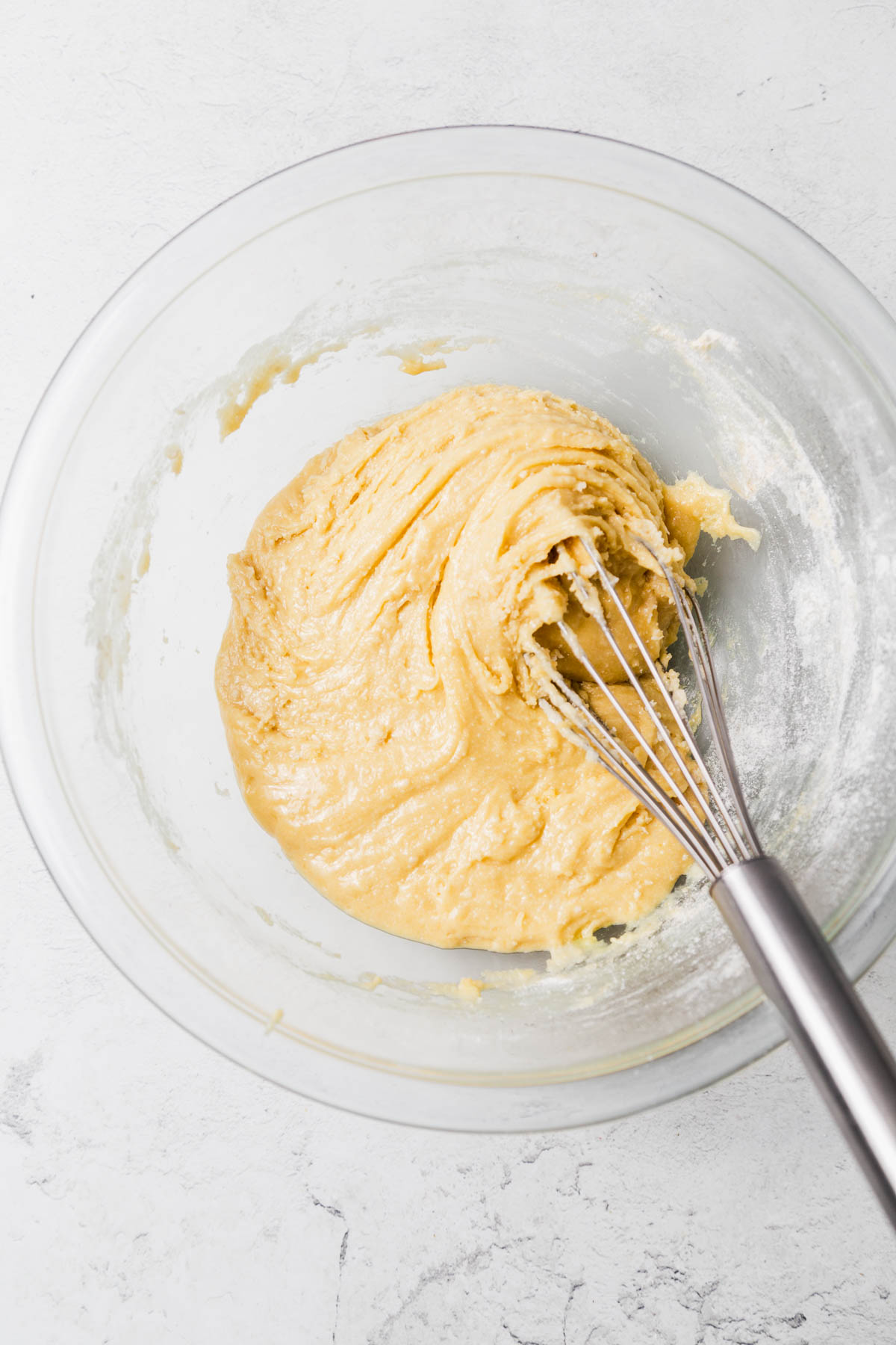 the cake mix cookie bar dough with a whisk.