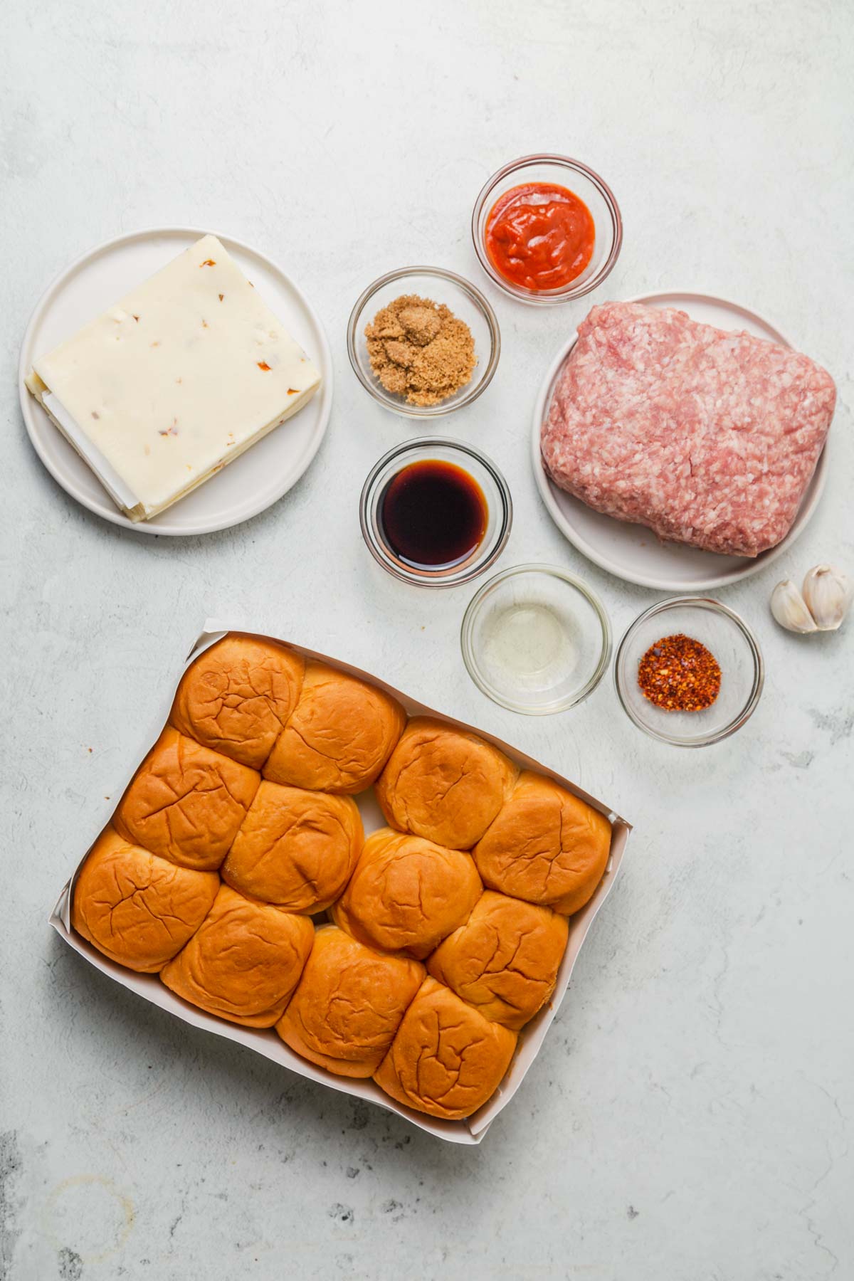 ingredients for cheeseburger sliders with hawaiian rolls.