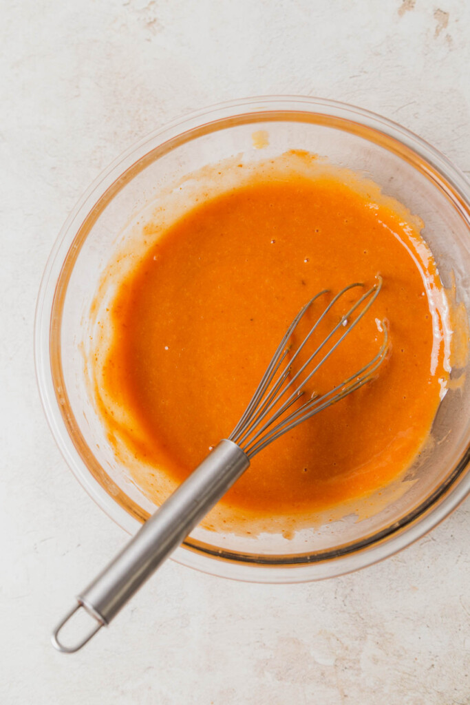wet ingredients with pumpkin puree added.
