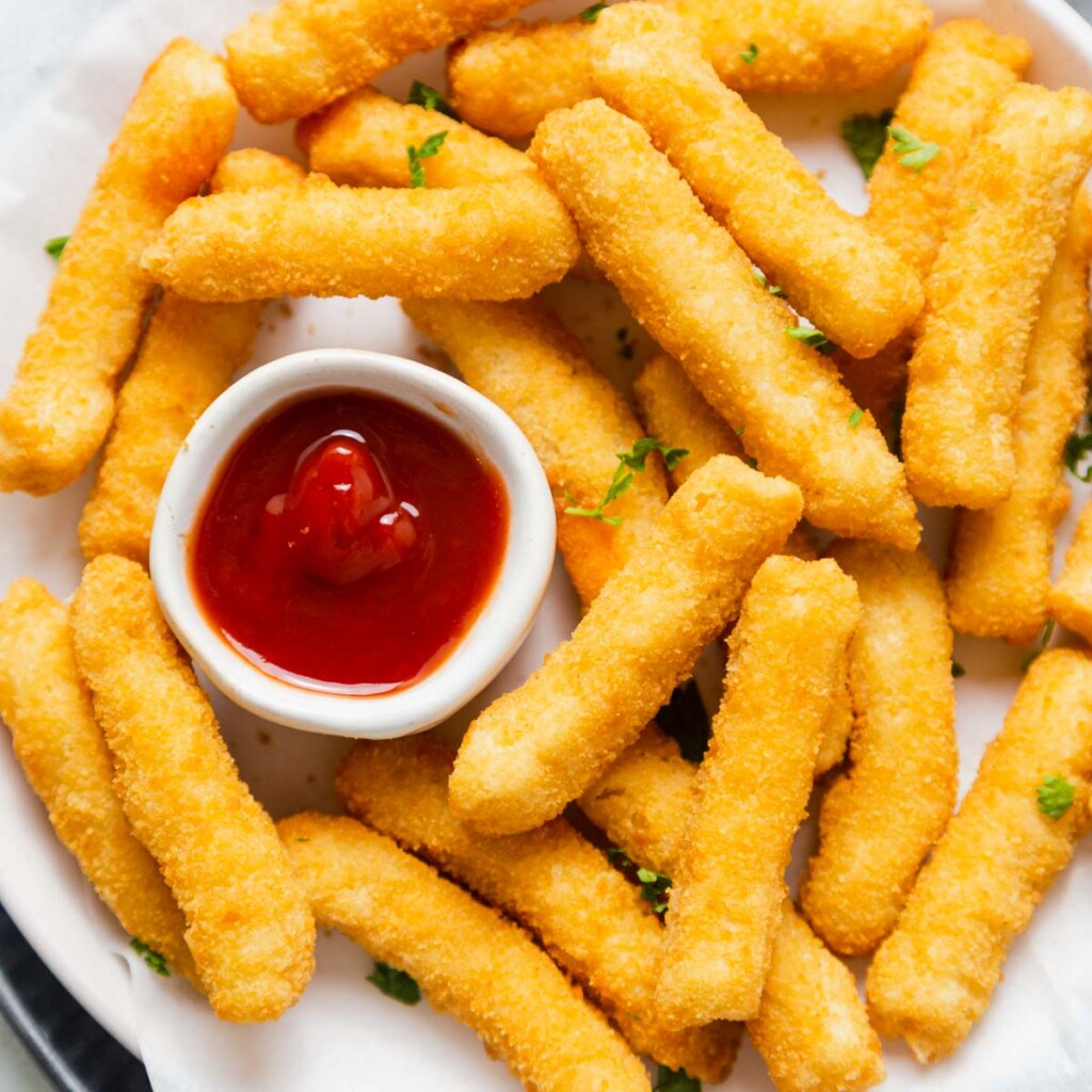 air fryer frozen chicken fries with ketchup.