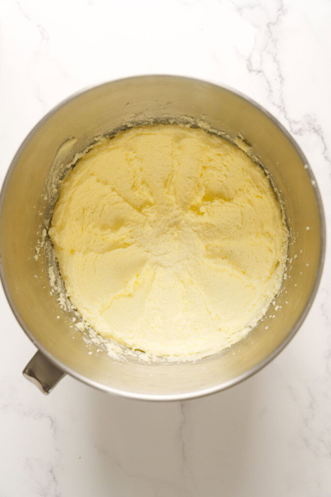 Creamed butter and sugar in the bowl.