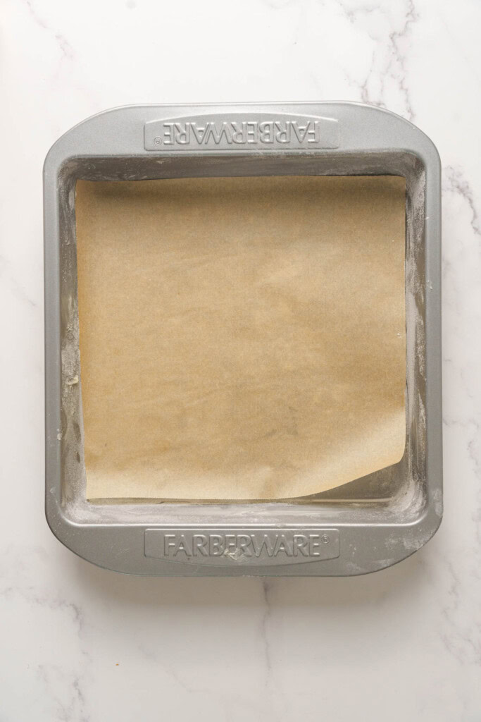 Cake pan prepped and lined with parchment paper.