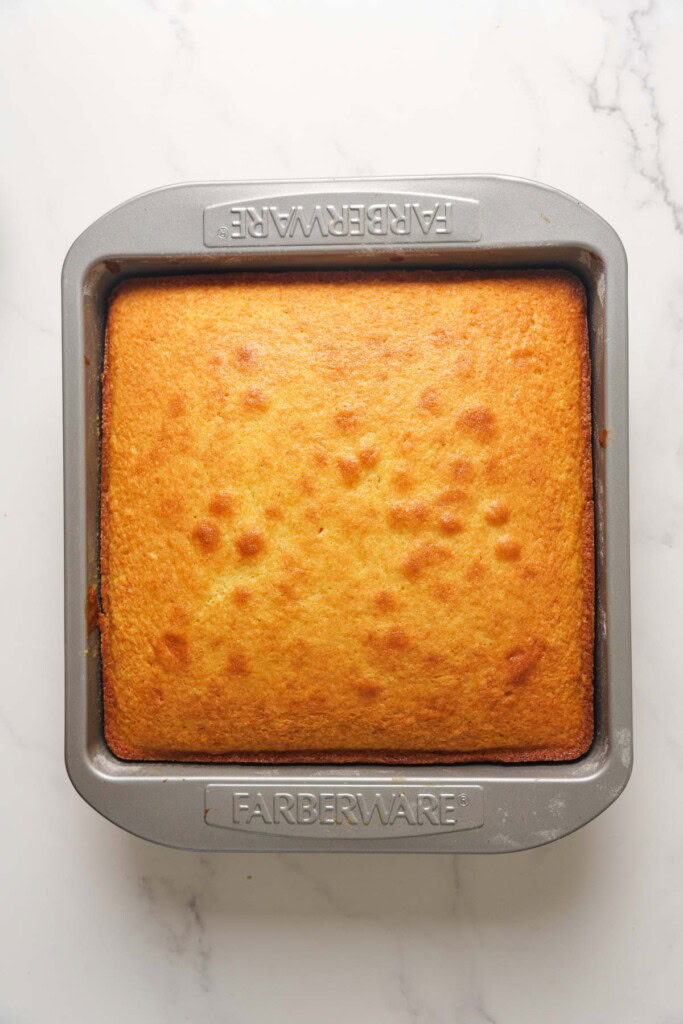 The baked butter cake in the pan.