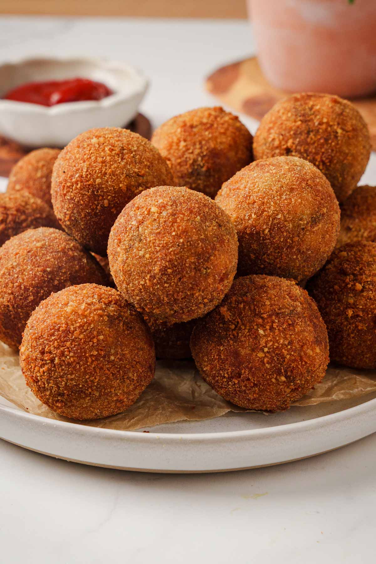 sri lankan fish cutlets on a plate.