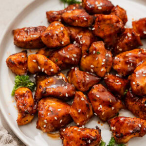air fryer chicken bites on a plate.