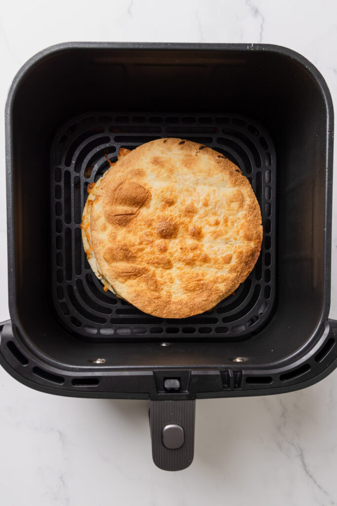 cooked chicken quesadilla in the air fryer.