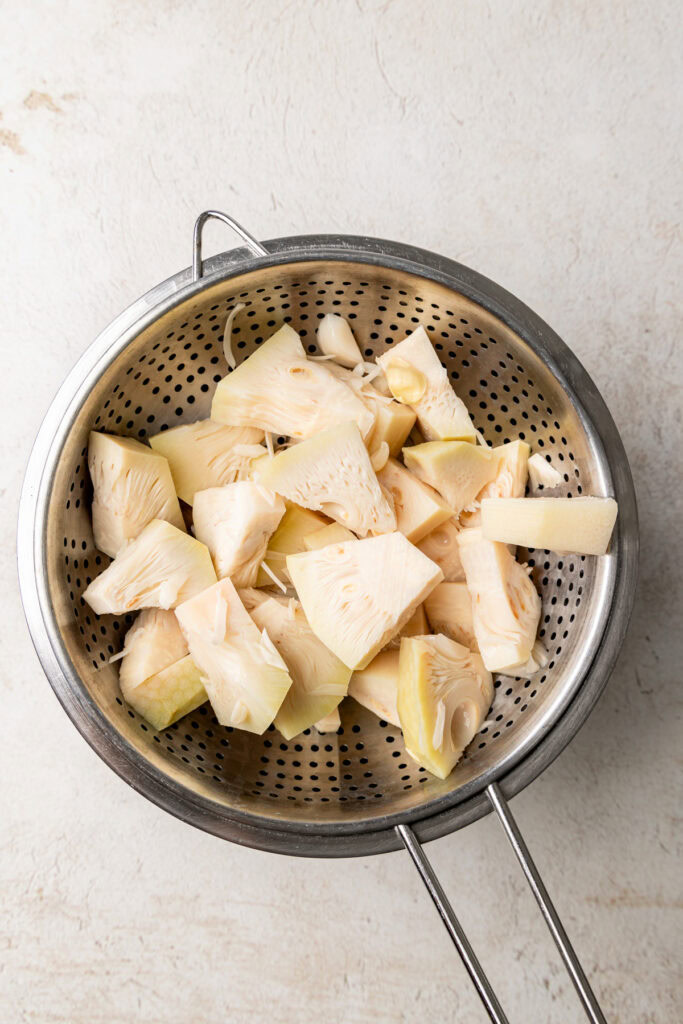 Two cans of young green jackfruit drained and ready for cooking.